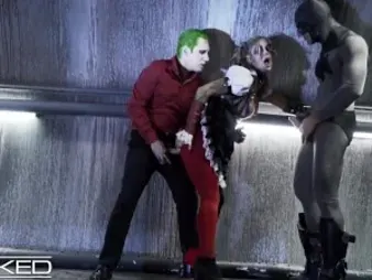 Harley Quinn gets ferociously double-teamed by Joker & Batman in Unholy cosplay gig